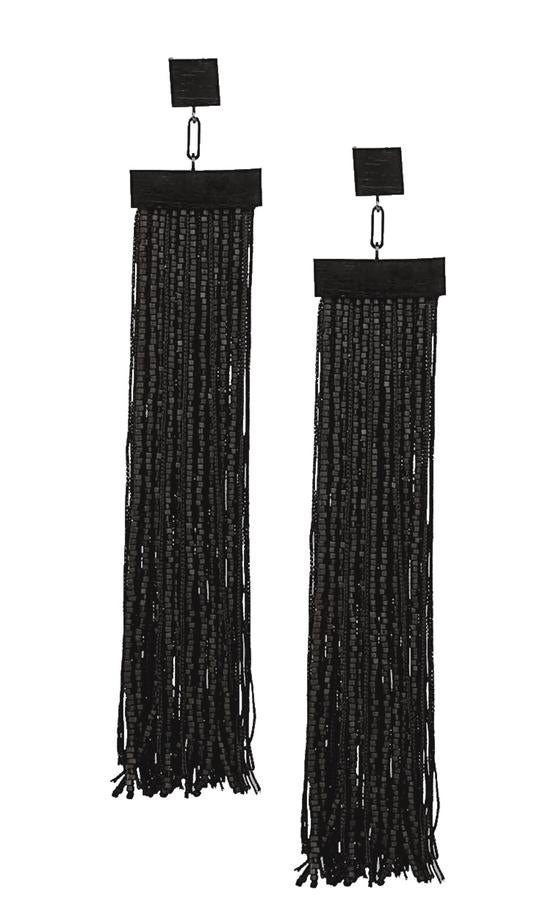 A lo largo Pendientes de Tom Ford (390 €).