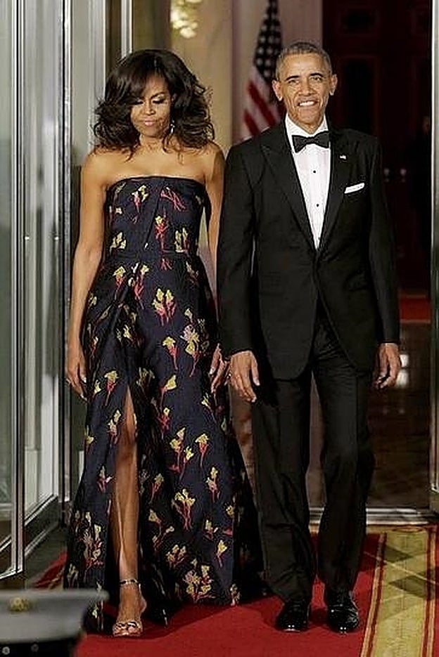 Los Obama a su entrada a la cena de Estado