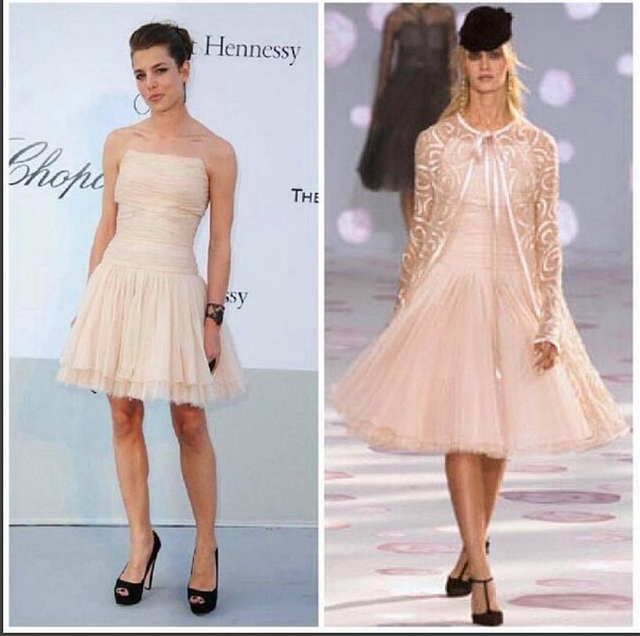 De nuevo en rosa empolvado en este palabra de honor al que acortó la falda y dio un aire rockero a golpe de complementos.