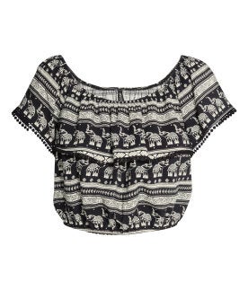 Los tops que enseñan los hombros son un 'must have' en todo festival