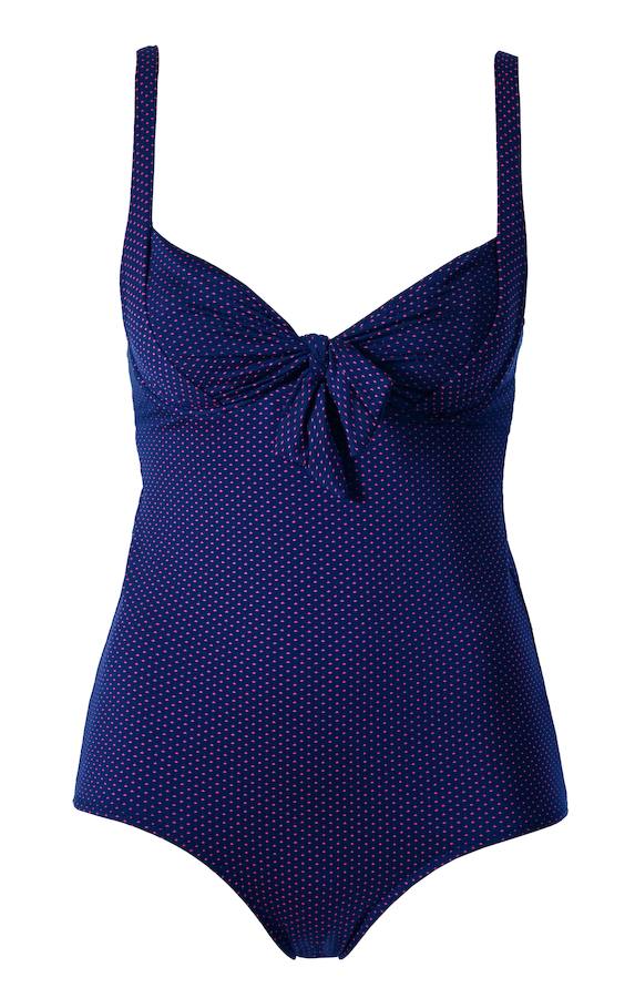 De escote balconett y con estampado de topos (Precio: 69 euros).