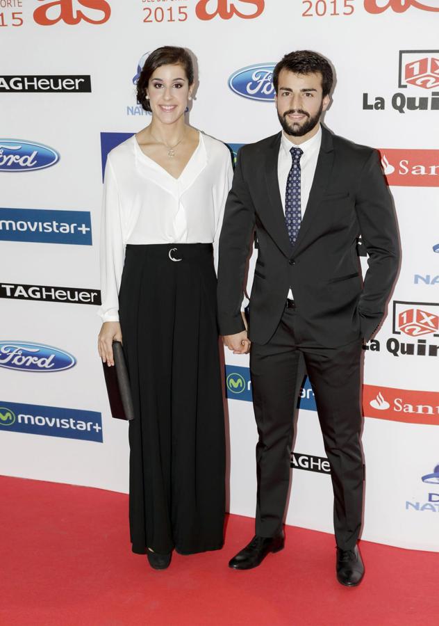 La número 1 del mundo tiene tiempo para el amor. Él se llama Alejandro y es su seguidor más fiel desde la grada.