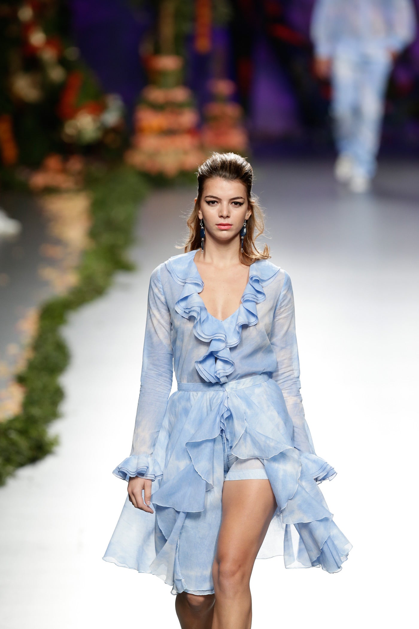 Los volantes fueron una característica que pudimos observar en varios de sus looks.