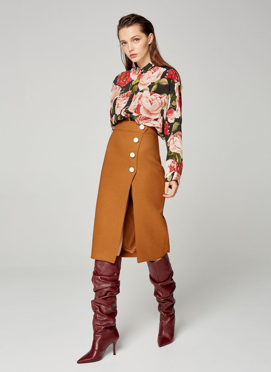 Botas altas de tacón burgundy de Uterqüe: 199 euros.