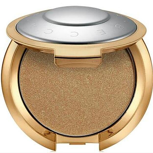 Light Chaser Highlighter en tono Topaz Flashes Gilt de Becca (34€). Exclusivo en Sephora.