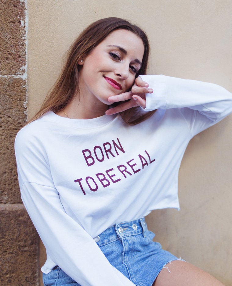 Sudadera corta con mensaje ‘Born to be real’ de Pimkie: 25,99 euros.