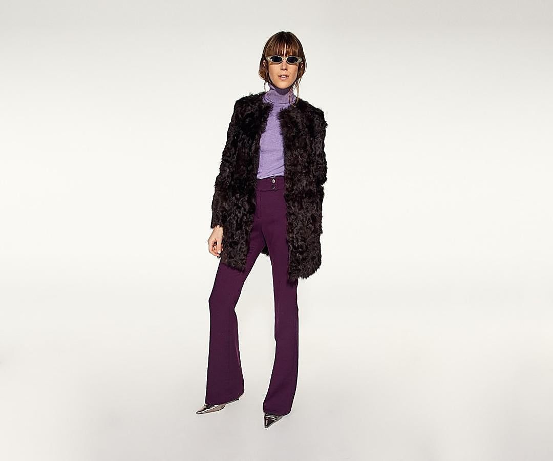 Un abrigo 'faux furry', como este de Sfera (rebajado de 189.99 a 129 euros).