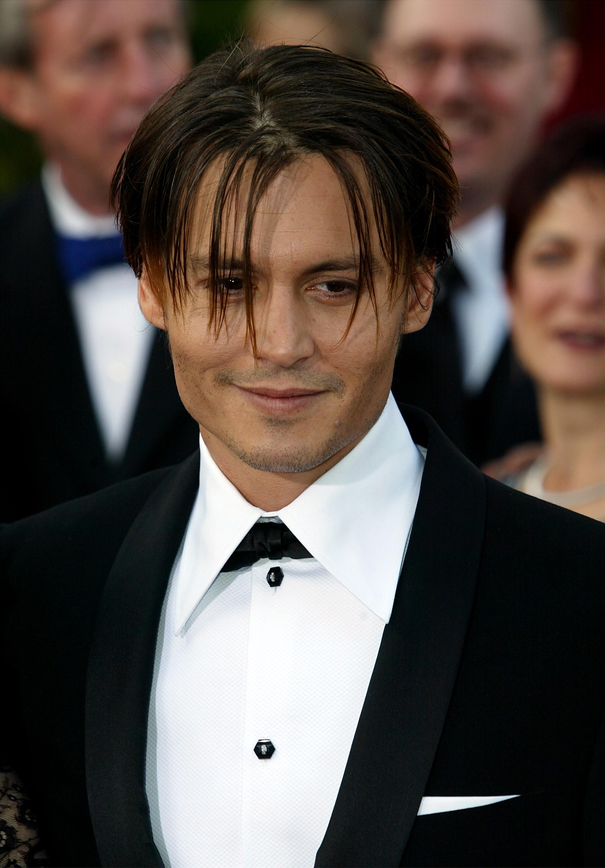 ¿Cuándo habéis visto sonreír a Johnny Deep? Seguramente pocas veces, pero no os preocupéis, está fotografía ya no se pierde.