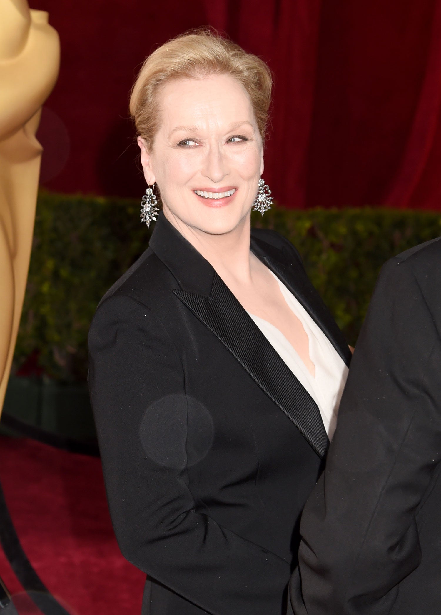 La sonrisa de Meryl Streep puede llegar a trasmitir una gran complicidad, sobre todo en esta fotografía capturada en los Premios Oscar 2015. ¿A quién estaría mirando la actriz?