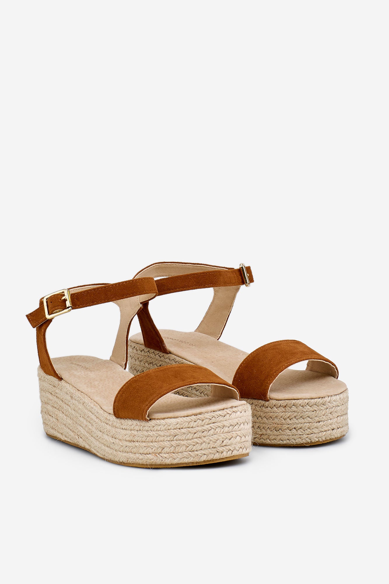 Sandalias de cuña color nudo de Women Secret: 29,99 euros.