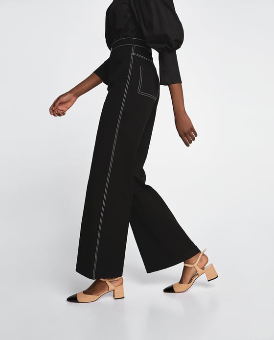 Ni unos zapatos bicolor con un poco de tacón, con los que ganar unos centímetros sin morir del dolor de pies