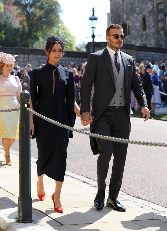 El matrimonio Beckham a su llegada a la boda entre el príncipe Harry y Meghan Markle.