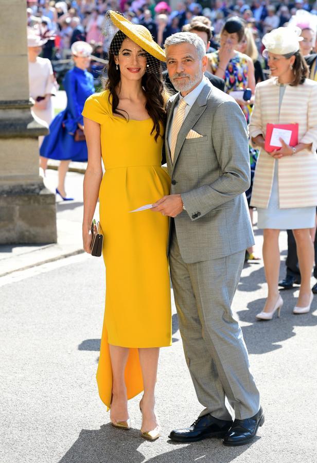 Amal Clooney fue sin lugar a dudas una de las invitada mejor vestidas de la boda de Meghan y Harry. La abogada experta en Derechos Humanos apostó por un espectacular 'look' en amarillo, firmado por Stella McCartney. Más elegante, imposible.