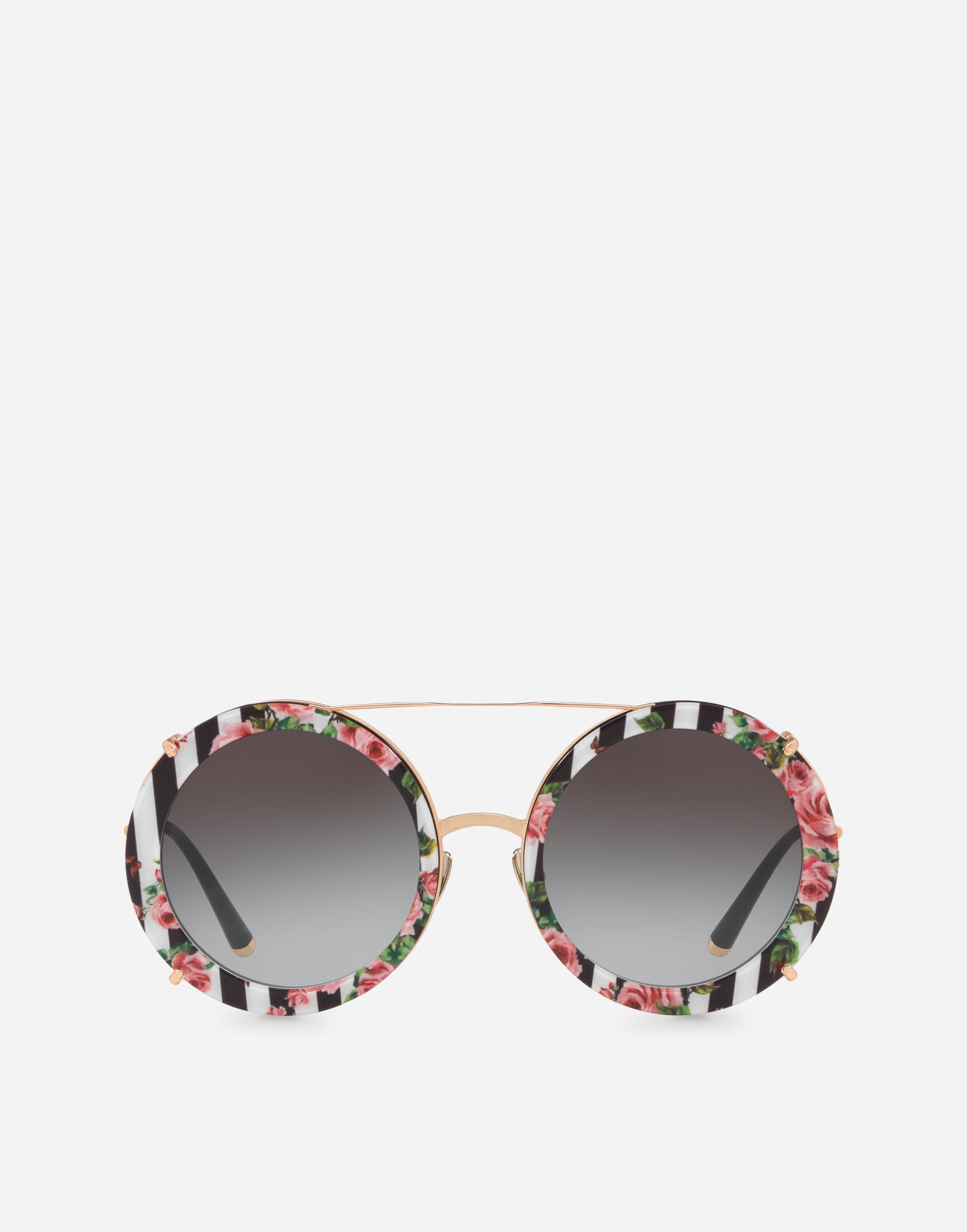 Gafas de sol vintage redondas con rosas de Dolce & Gabbana. Nosotras ya nos vemos este verano en la playa con ellas.