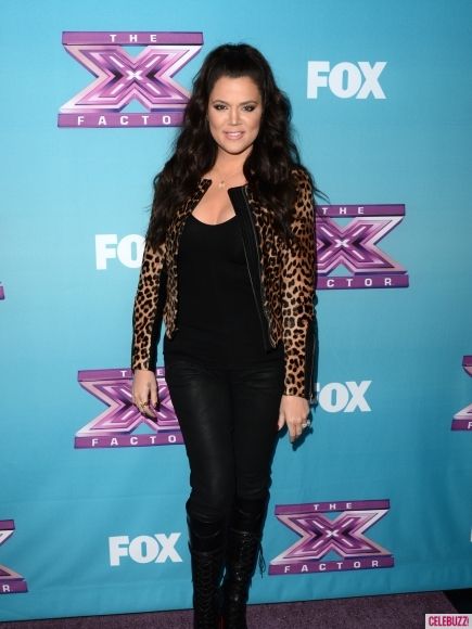 Más estampado animal para un estilismo conservador, raro en ella...