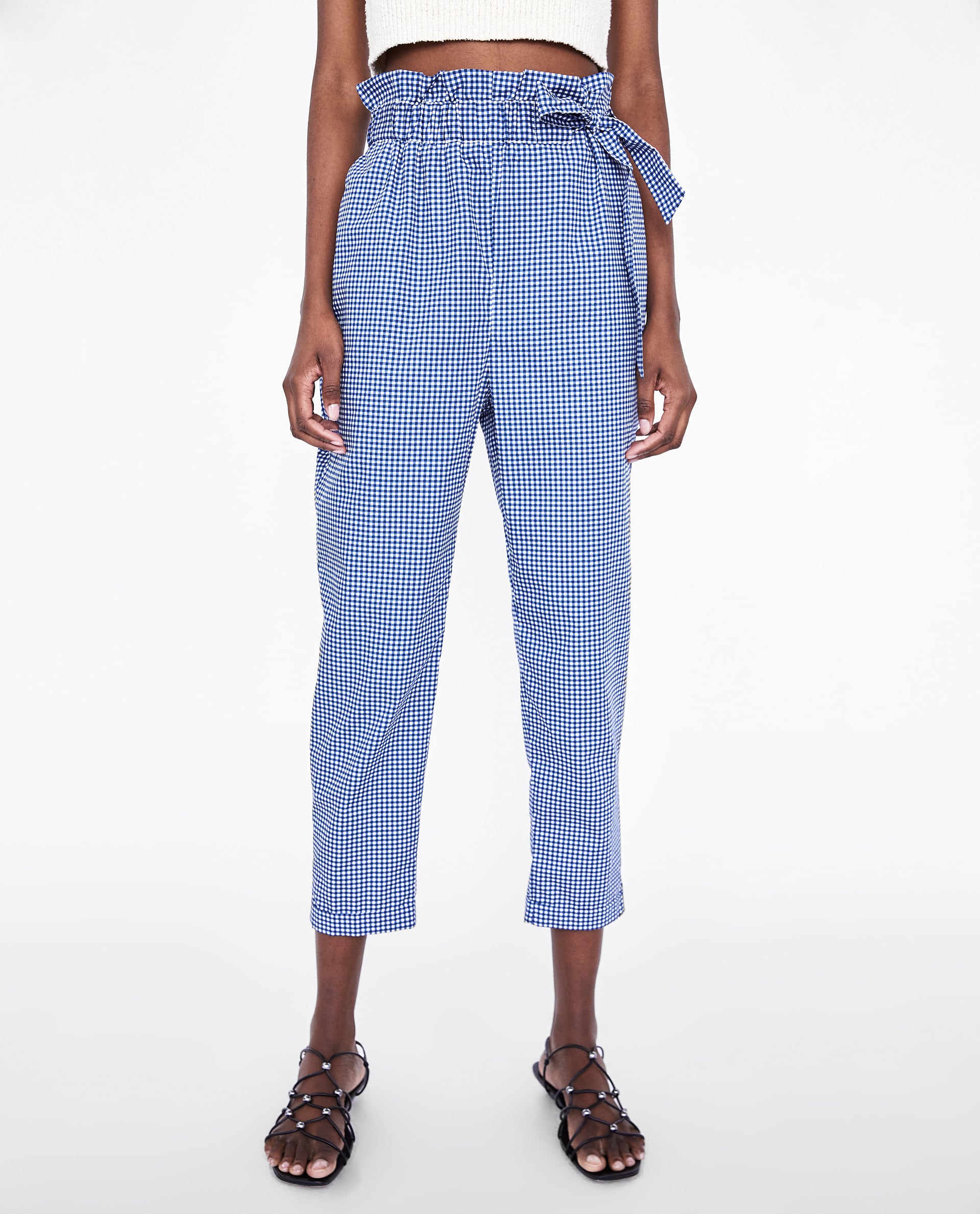 Pantalón popelín con lazo de Zara: 22,95 euros.