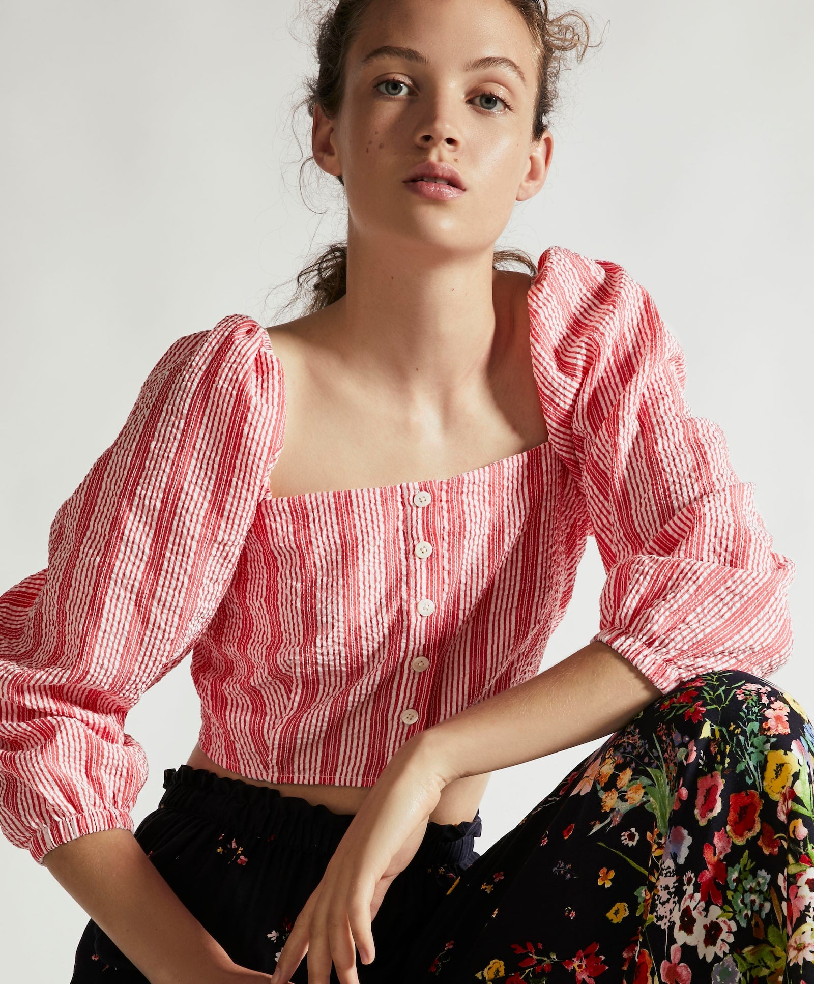 Camiseta con manga larga y botones de Oysho: 7,99 euros.