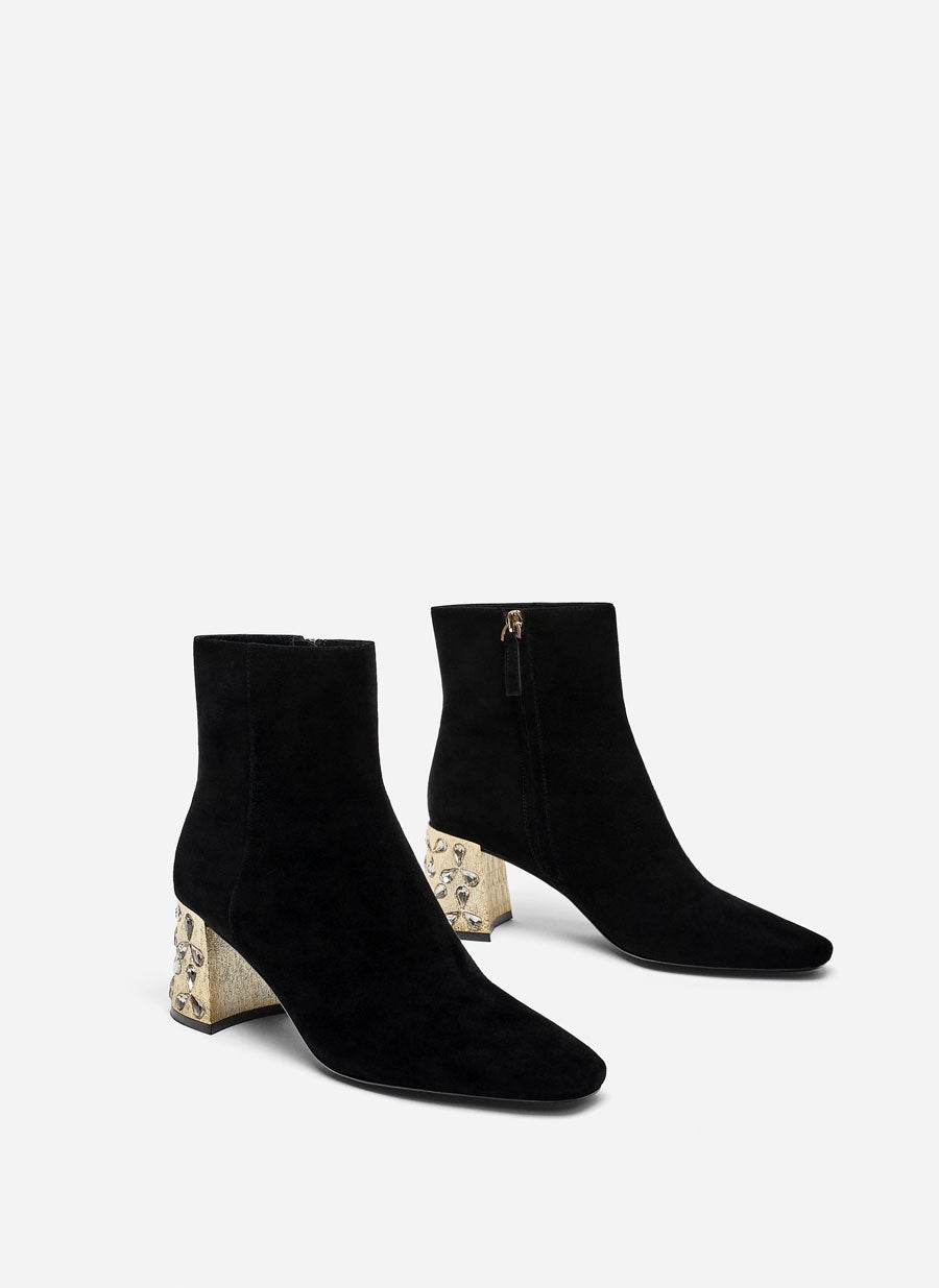 Botín de ante con tacón joya de Uterqüe: 150 euros.