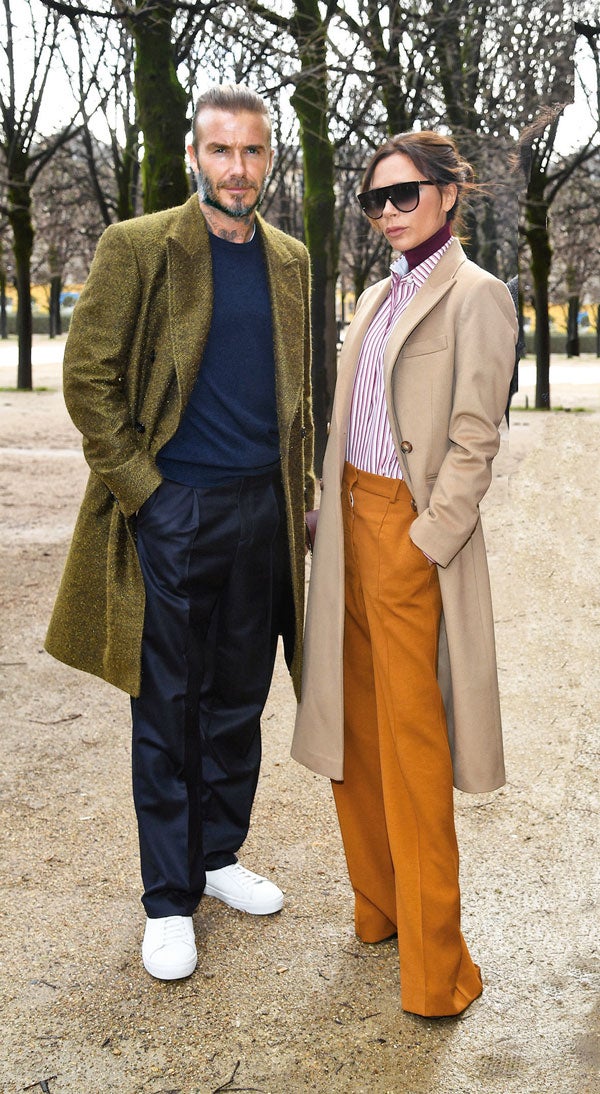 Victoria y David Beckham a la salida del desfile de Louis Vuitton en febrero de 2018, en París.