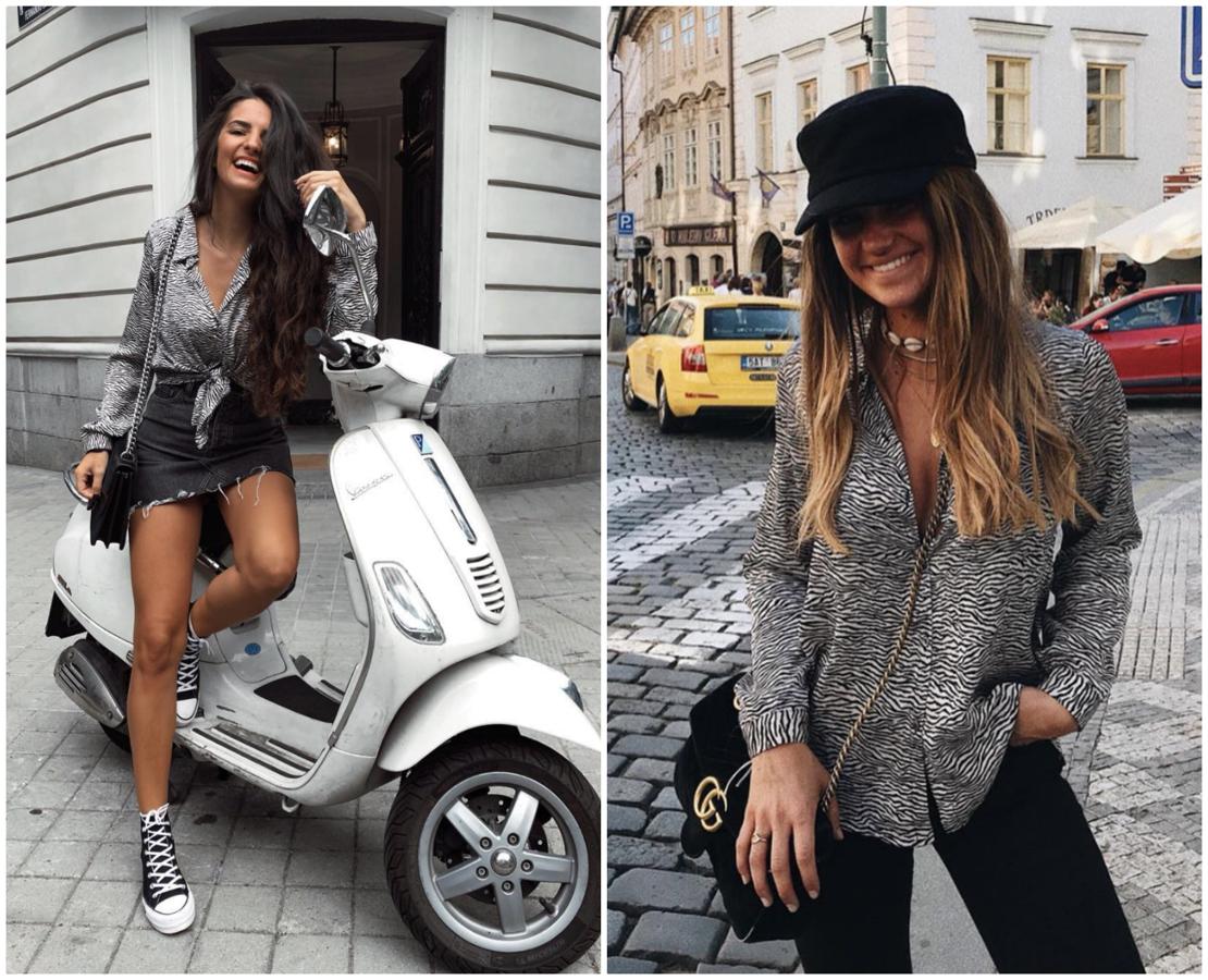 Marta Soriano y Marta Vidaurreta apuestan por la blusa con estampado de cebra en blanco y negro, y lo combinan a las mil maravillas con denim oscuro, creando looks básicos con un toque tendencia ideal.