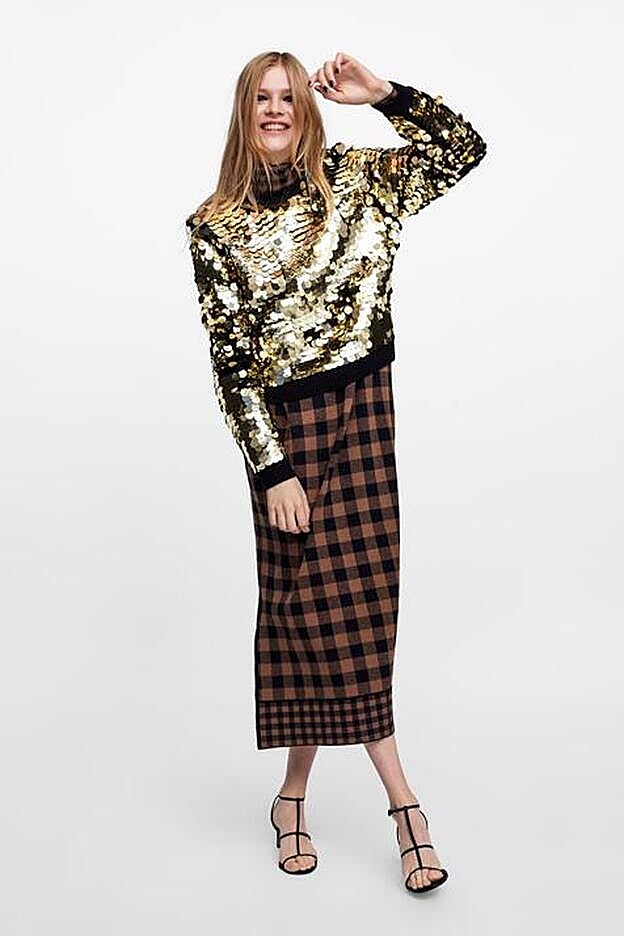 Cuenta con detalle de lentejuelas a contraste.