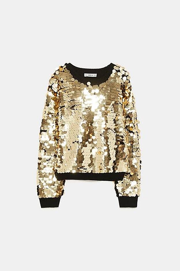 Jersey de punto de cuello redondo y manga larga con lentejuelas, 49,95 euros.