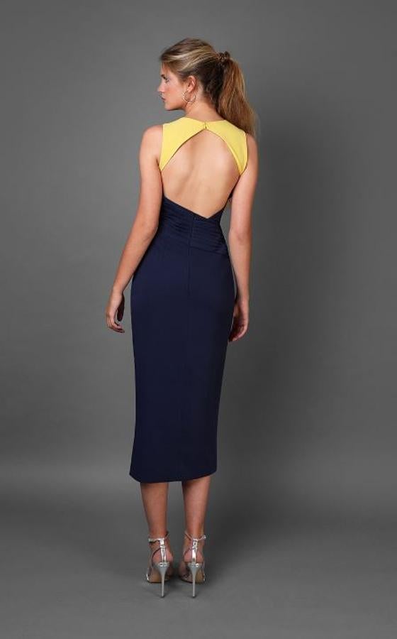 La espalda y la silueta del vestido Guyán de Victoria by Vicky Martín Berrocal te harán presumir de tipazo con tu próximo look de invitada. Precio: 325 euros.