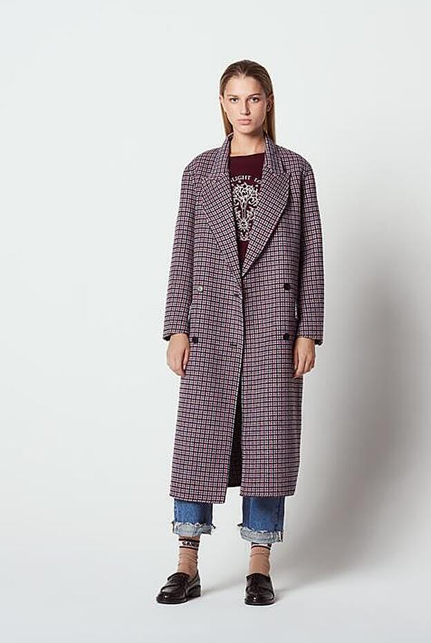 Abrigo de cuadros de paño, 475 euros.