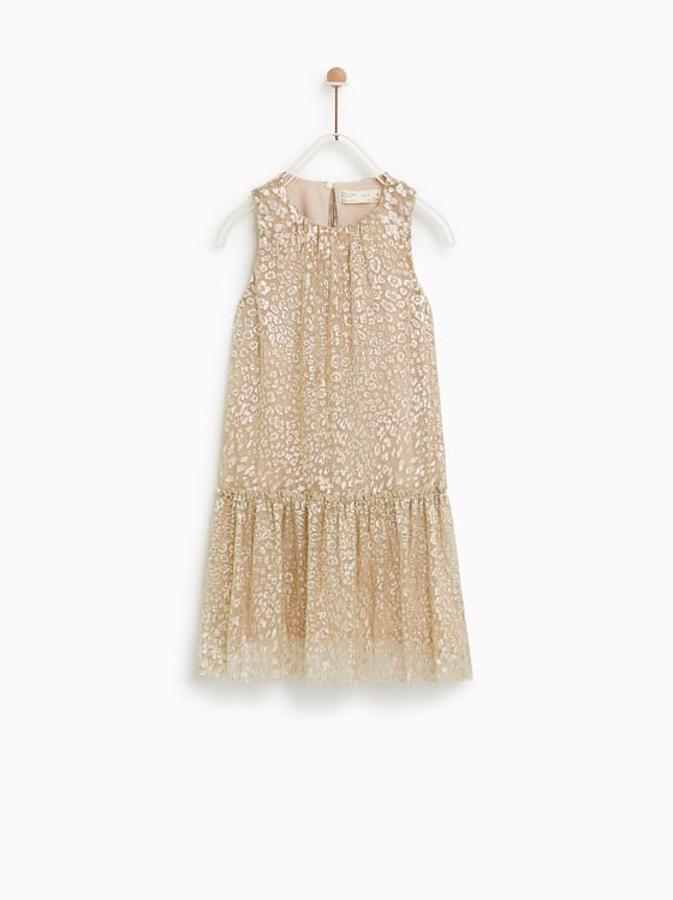 Vestido en color crema con estampado print animal y con detalles en brillos: 19,95€ en Zara Kids