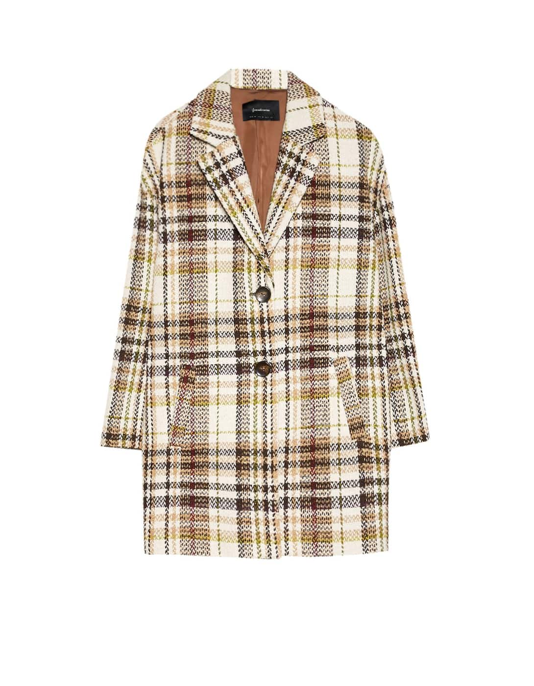 Abrigo largo con estampado de cuadros de Stradivarius. (39,99 euros).