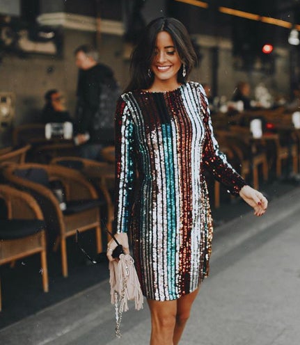 María Fernández Rubíes, que últimamente nos pone los ojos como platos con sus 'outfits', se cuela entre nuestras favoritas con su vestido 'brilli brilli' con franjas verticales. Es de Imperial Fashion y no está dispoible.