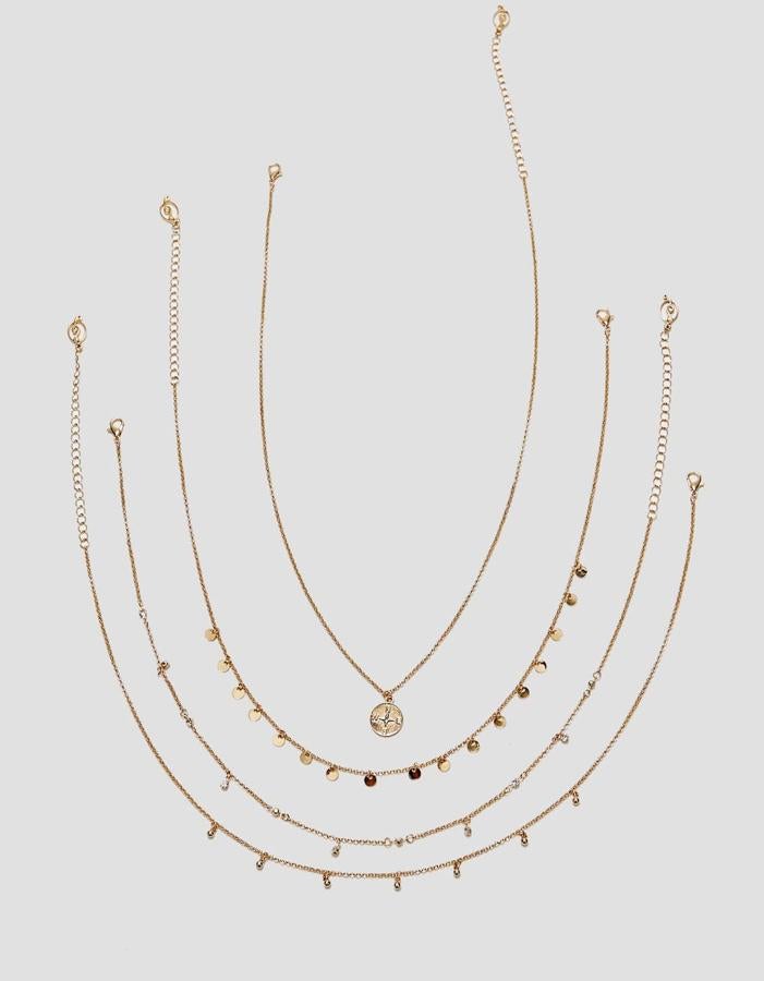 Cinco colgantes adornados con monedas y cristales (6,39 euros).