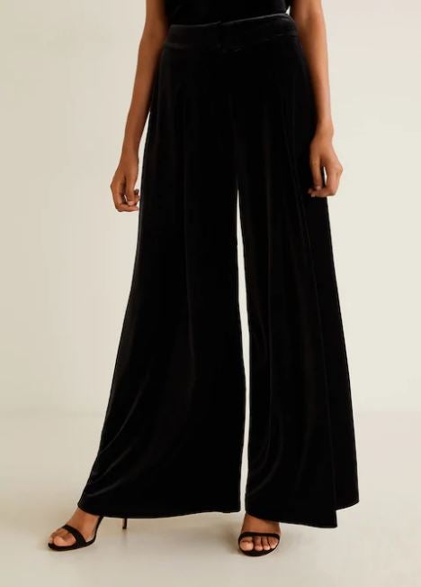 Los palazzo son una apuesta segura en tus looks de Nochevieja. Estos XXL nos encantan. (59,99 euros).