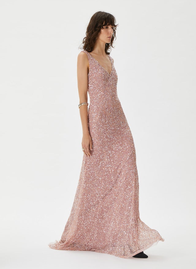 Si quieres brillar con luz propia, no dejes escapar este vestido de lentejuelas de las rebajas de Adolfo Domínguez, que pasa de 548 a 274 euros.