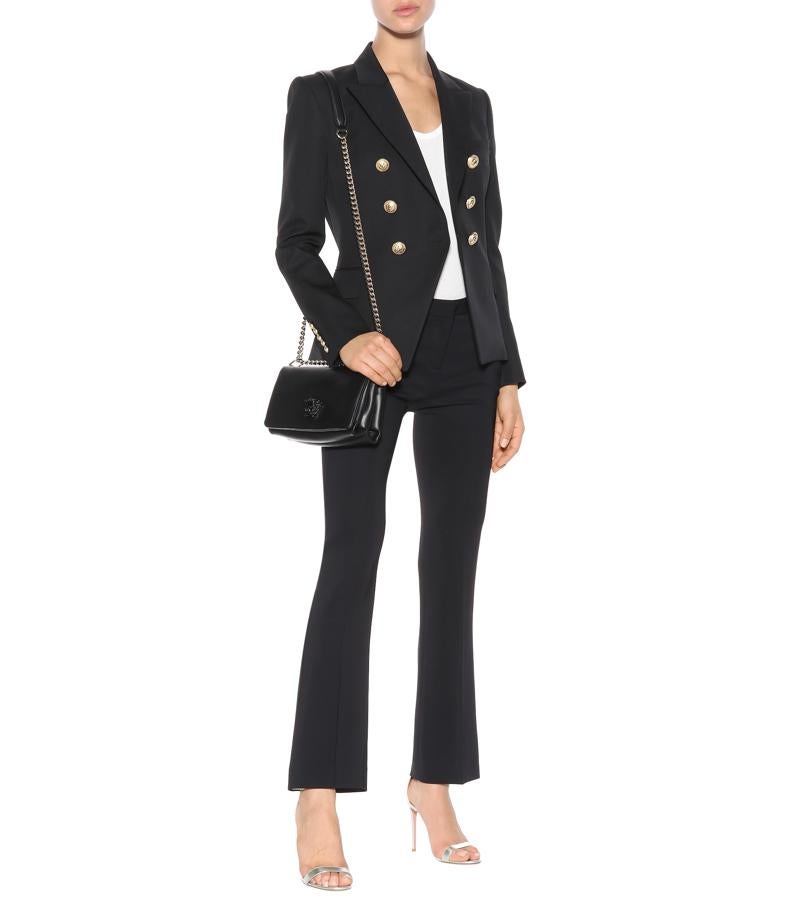 Si buscas un clásico atemporal que nunca pase de moda, invierte en el Palazzo de Versace, que está con un -50% de descuento en las rebajas de MyTheresa. Precio final: 745 euros.