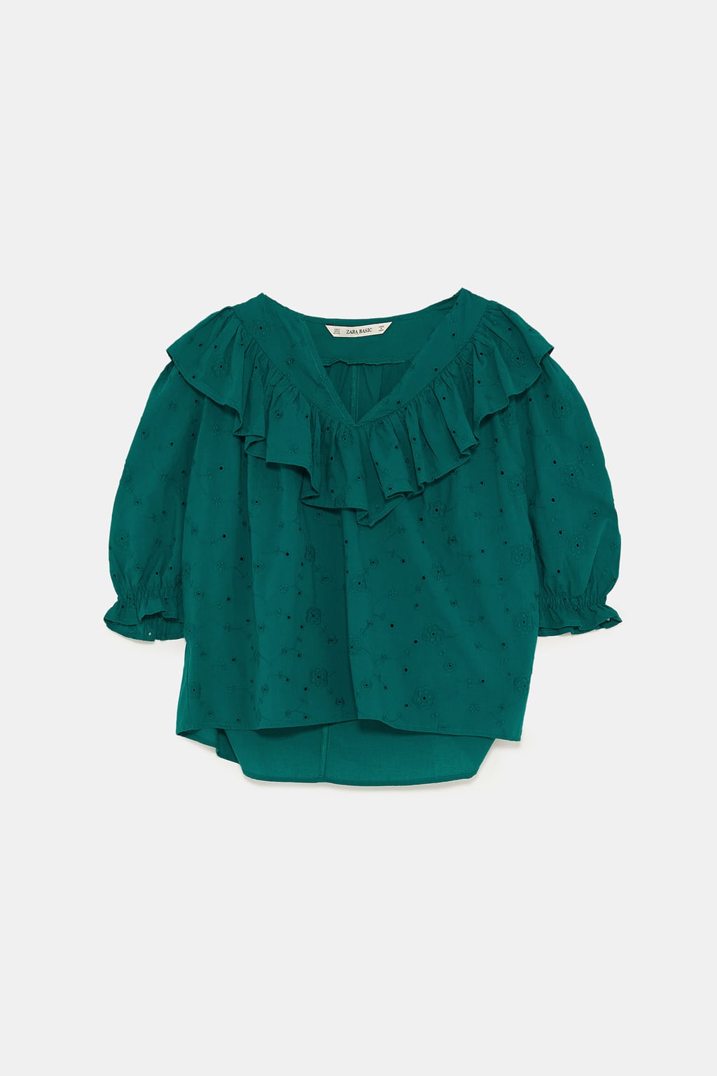 Cuerpo perforado con bordados y volantes de Zara: 9,99 euros.