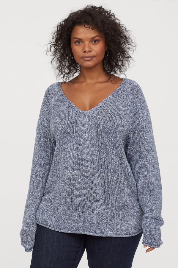 Jersey de punto azul claro con diseño jaspeado, 14,99 euros.