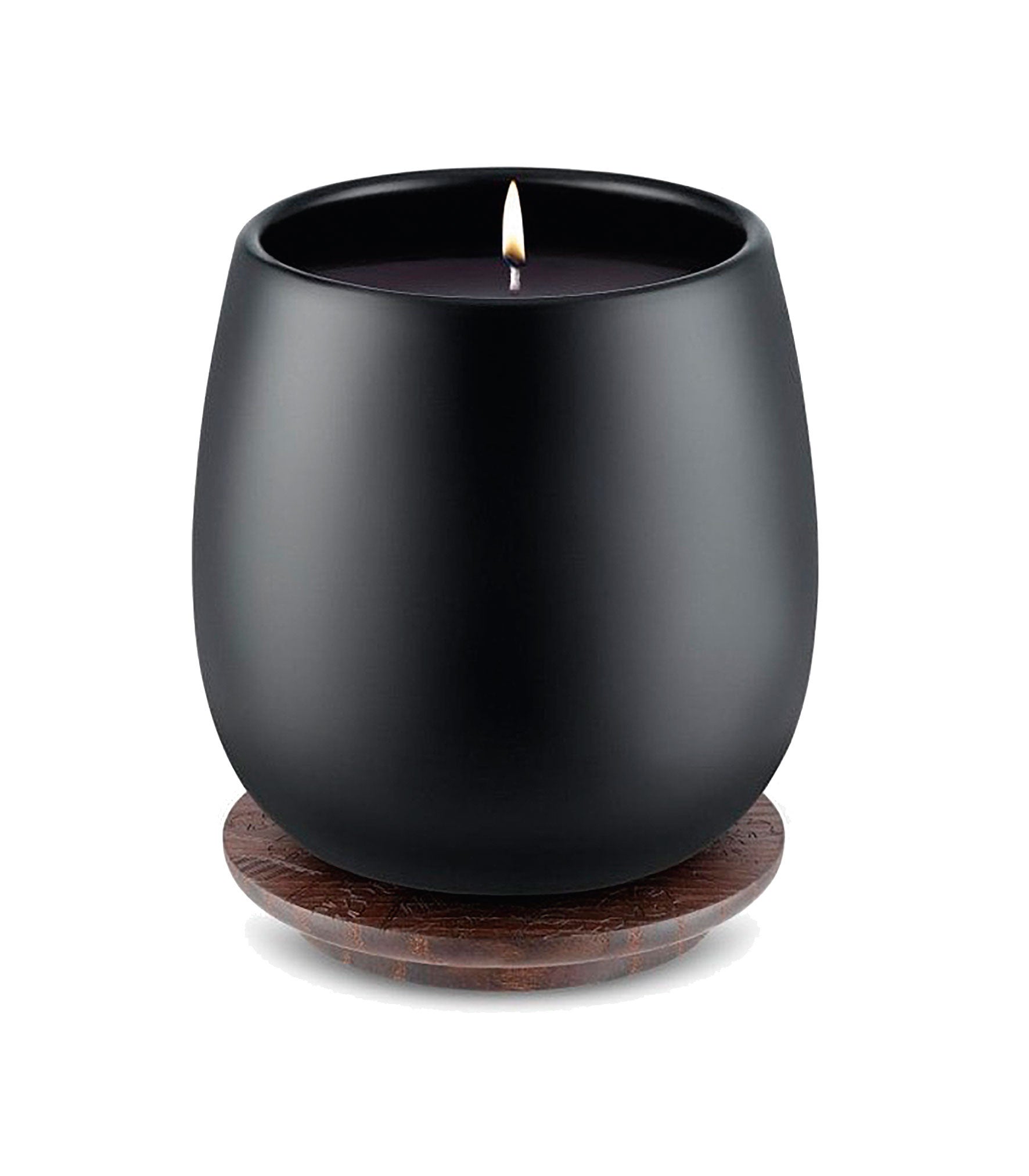 Marcel Wanders propone unas velas en cerámica con una tapa que se convierte en plato de madera.