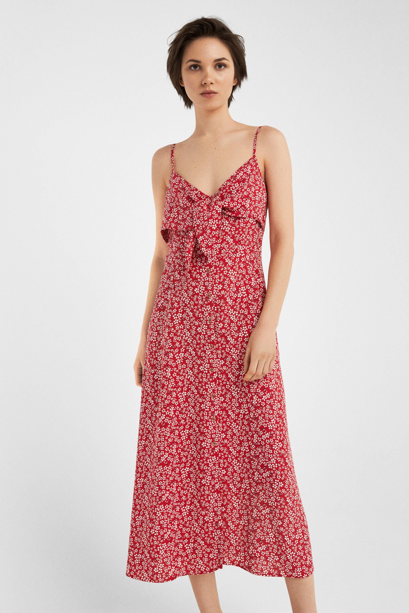 Vestido midi con estampado de nudo: 35,99 euros en Springfield.