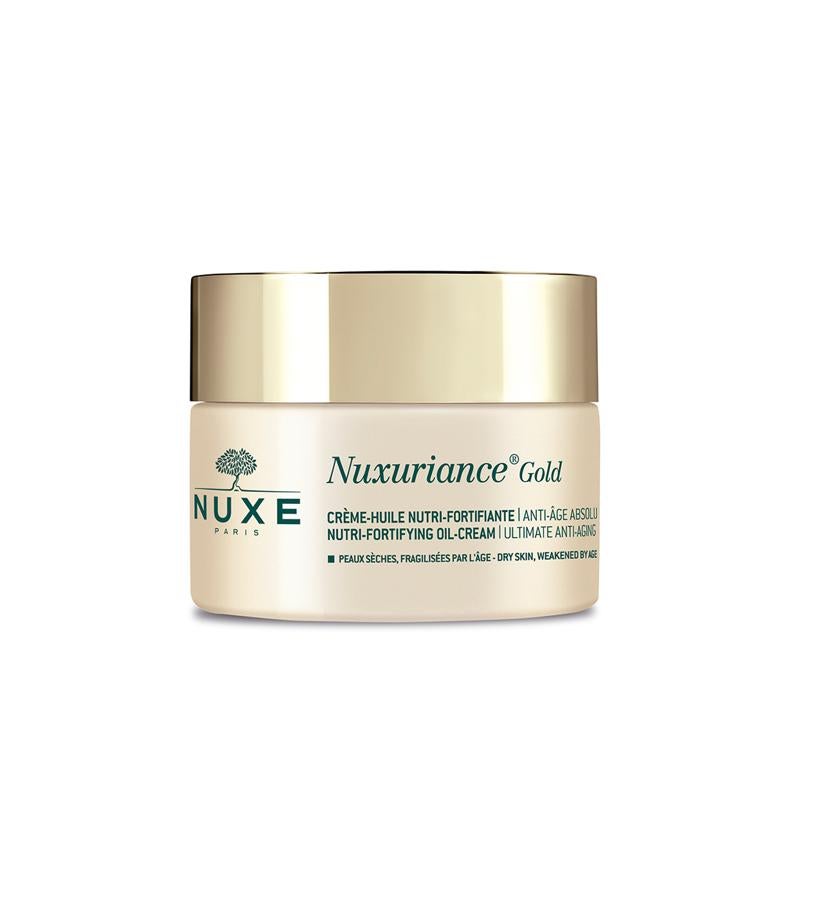 Esta crema-aceite fundente de textura biomimética infusionada con aceite vegetal se fusiona con la piel. Transmite fuerza, hidratación y luminosidad a las pieles secas y fragilizadas por la edad. Contiene células bi-floreales de azafrán y buganvilla (estimulan el nacimiento de nuevas células primordiales de la piel), extractos de jiaogulan y de flor de jaram (reconstituye los lípidos esenciales para la juventud de la piel) y El oleoactivo de rosa de porcelana (ilumina la tez aportando mucho brillo). C rema-Aceite Nutri-Fortificante Antiedad Absoluto Nuxuriance Gold de Nuxe  (69,90 €).