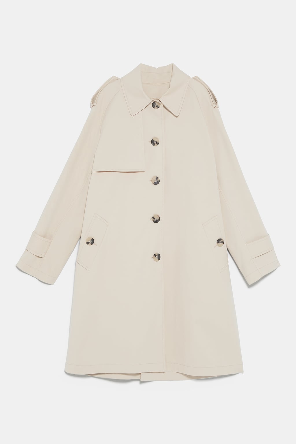 Trench de cuello solapa con manga larga con detalle de forro interior estampado. (Zara, 89,95 euros).
