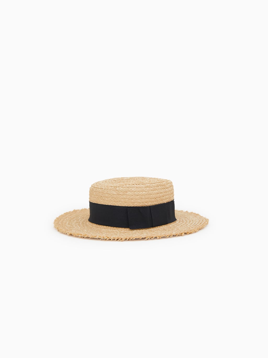 Sombrero de rafia con detalle de cinta: 10,95 euros en Zara Kids.