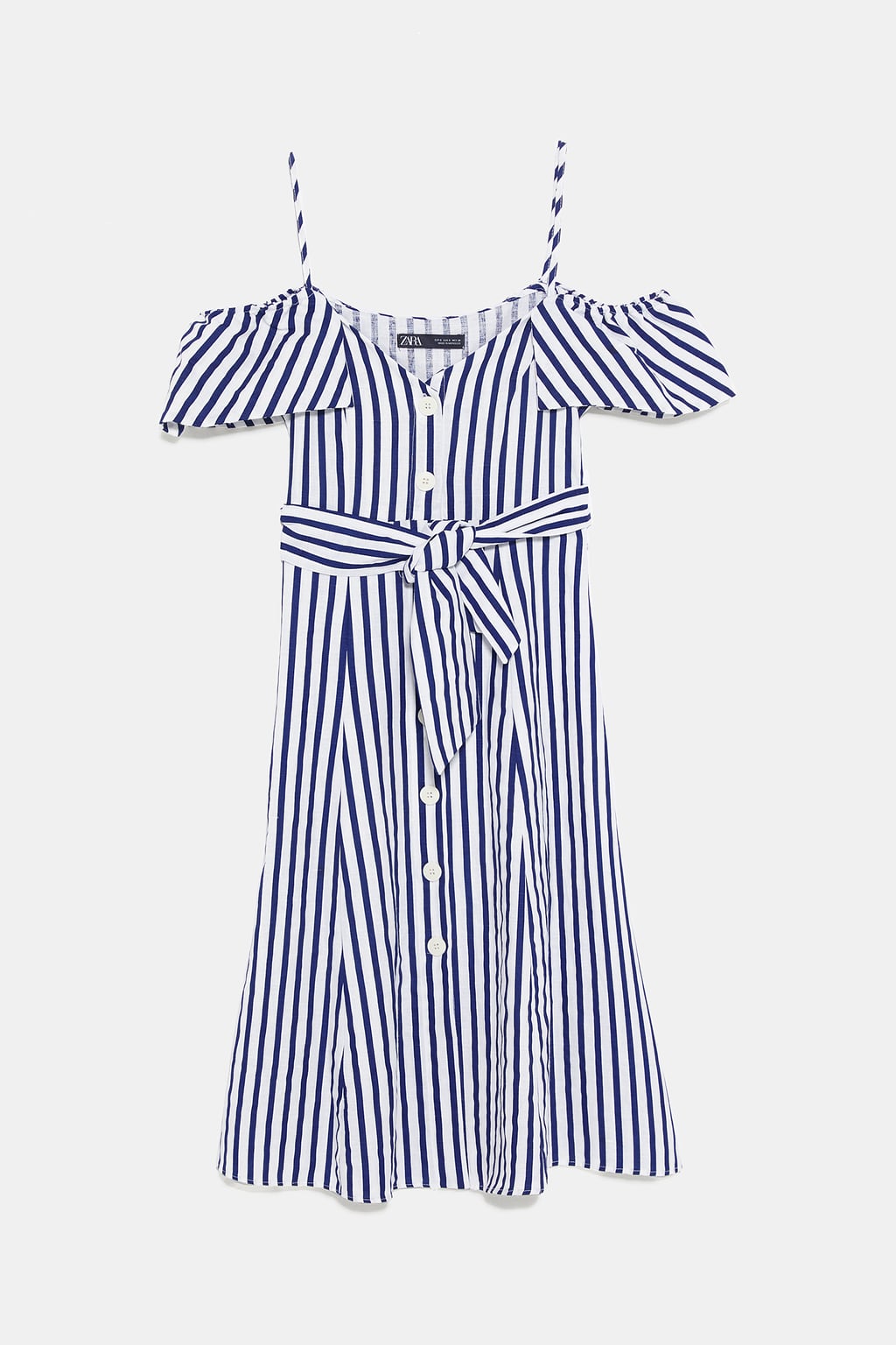 Vestido cut out estilo navy con los hombres al aire y cinturón que se ajusta a cualquier silueta. (39,95 euros).