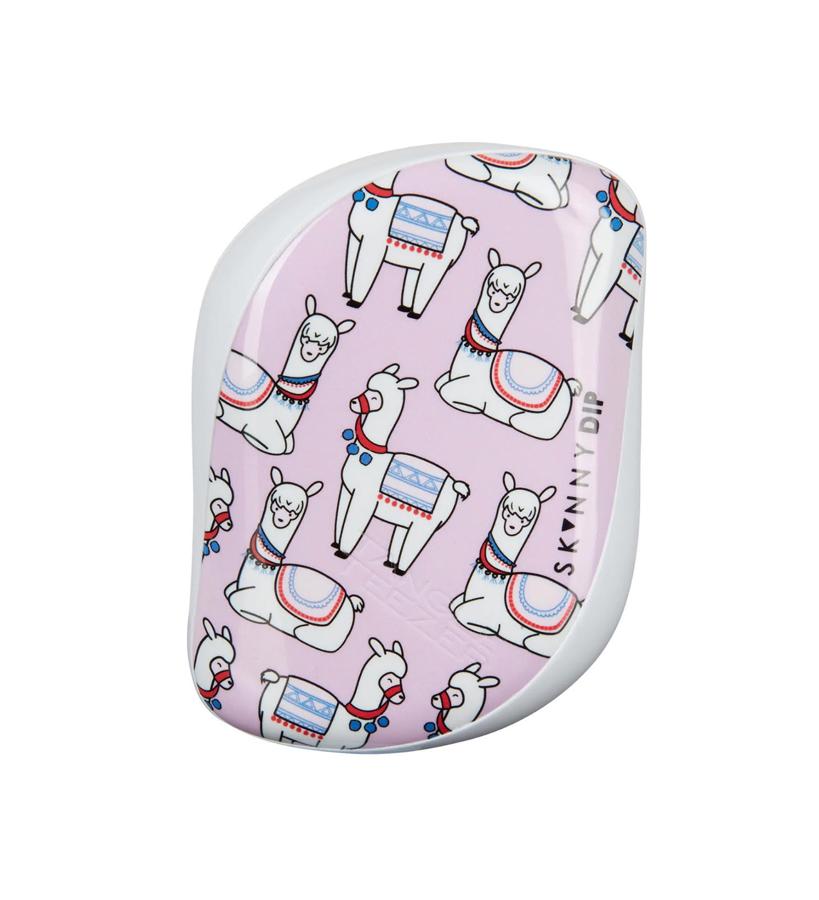 Alegra tu neceser con un cepillo divertido, que esconde una tecnología de púas flexibles que desenreda el pelo sin romperlo ni dañarlo y que puedes llevar en el bolso por su formato compacto.  Lovely Llama de Tangle Teeze r (16,55 €).