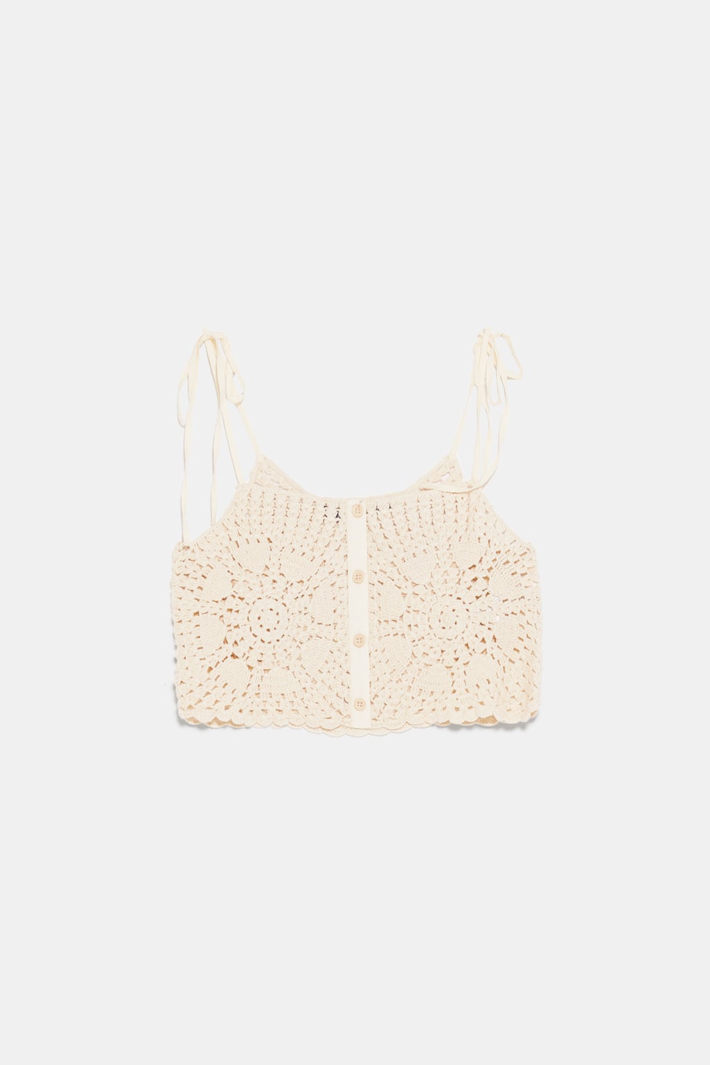 Top crochet en color nudo de Zara: 9,99 euros.