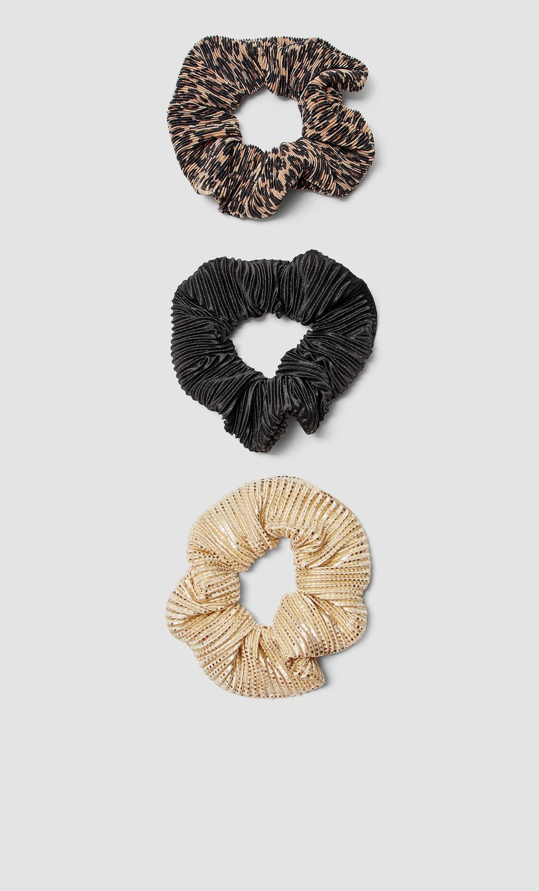 Pack de coleteros plisados varios colores. (5,99 euros).