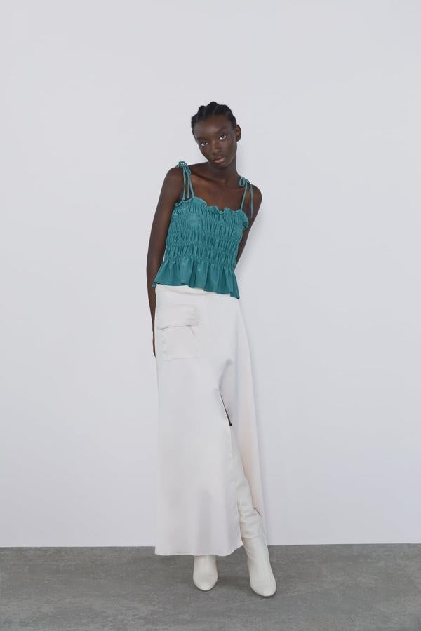 Top fruncido agua marina por 12,95 euros.