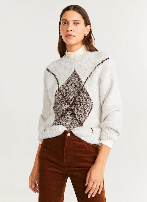 Todo a un rombo con este jersey calado de Mango. (35,99 euros).