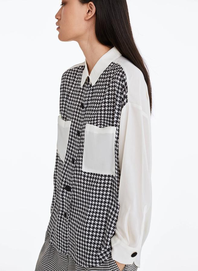 La pata de gallo está indiscutiblemente de moda. Hazte con esta blusa de Uterqüe en rebajas porque se ha quedado a 49,95 euros de los 79 que costaba.