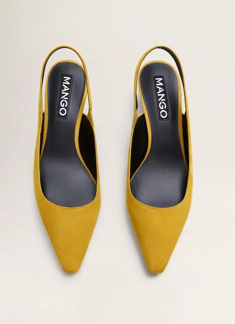 Zapato de piel con tacón cuadrado de 4 cm en tono mostaza de Mango. Antes: 39,99 euros. Ahora: 19,99 euros.